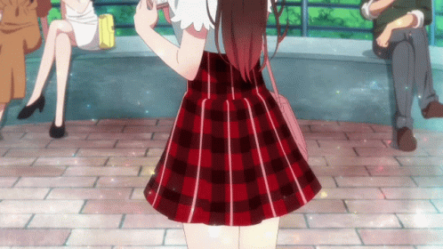 Girl In Red Plaid Skirt Walking On Brick Sidewalk GIF