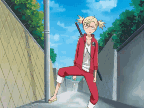 Girl in Red Tracksuit With Number 18