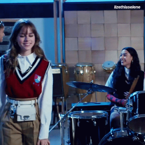 Girl in Red Vest at Drums