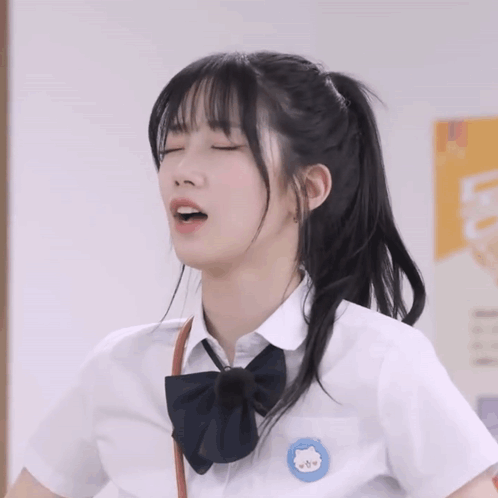 Girl in School Uniform Blue Badge A
