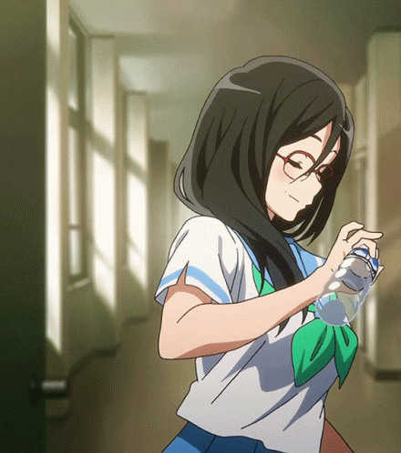 Girl in School Uniform Holding Bottle