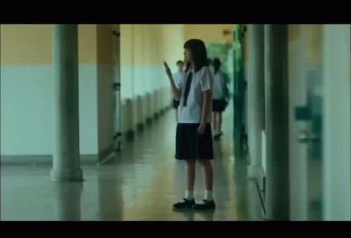 Girl in School Uniform Holding Sword