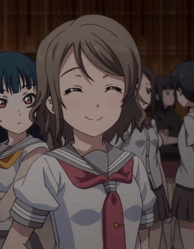 Girl in School Uniform Smiling in Crowd