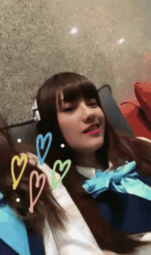 Girl In School Uniform With Hearts GIF