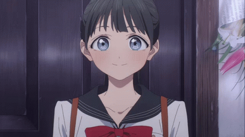 Girl in School Uniform With Red Bow