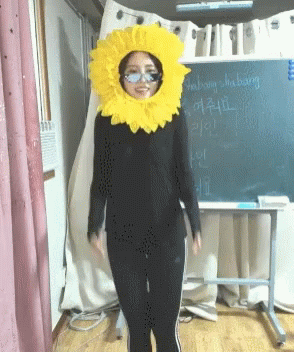 Girl in Sunflower Costume Saying Shabang Sha Bang