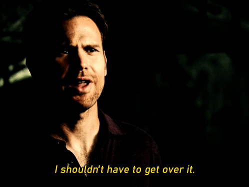 Girl In Sunglasses And Zhotcha Shirt In Front Of Number One GIF