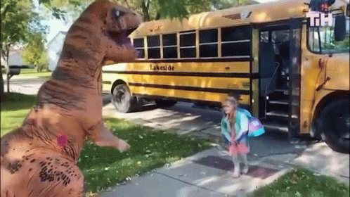 Girl In T-Rex Costume Getting On School Bus GIF