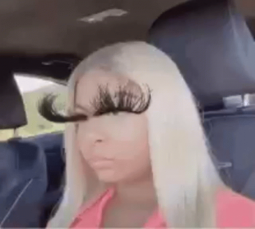 Girl In The Car With Long Eyelashes GIF