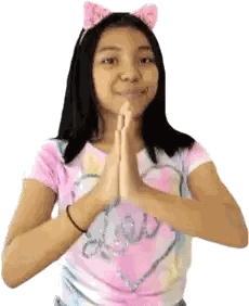 Girl in Tie Dye Shirt and Cat Ears Praying