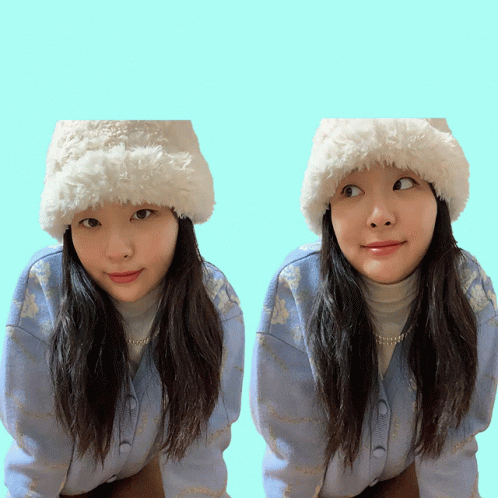 Girl in White Hat and Blue Sweater