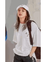 Girl in White Hat and T-Shirt