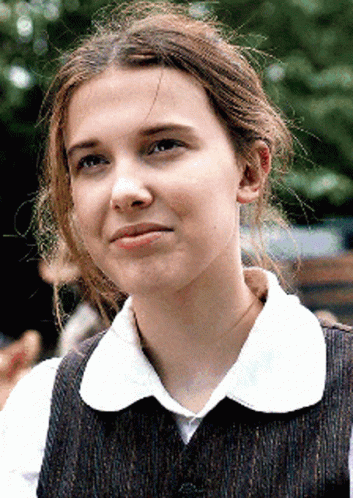 Girl in White Shirt and Vest