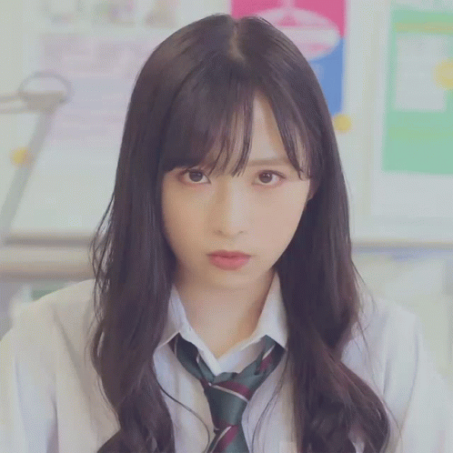 Girl in White Shirt With Tie and Long Hair
