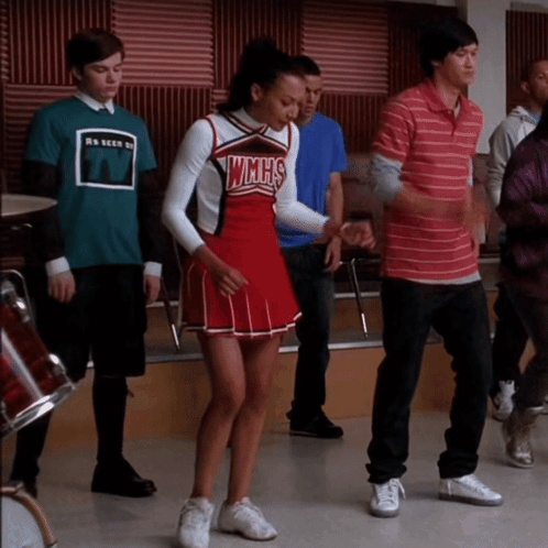 Girl in WMHS Cheerleading Outfit Dancing