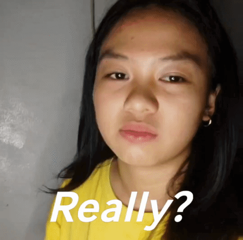 Girl in Yellow Shirt Making Funny Face Really