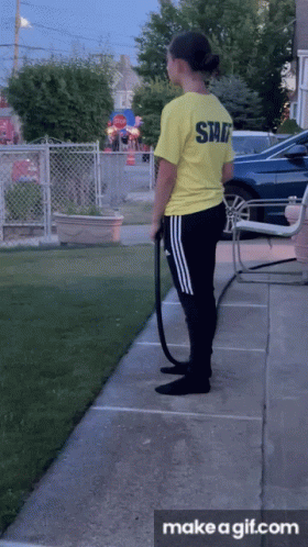 Girl in Yellow Shirt Saying Staff