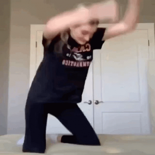 Girl Jumping Up And Down On The Bed GIF