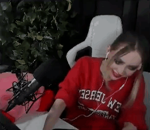 Girl Laughing And Bang Head On Desk GIF