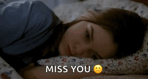 Girl Laying In Bed Sad Face Miss You GIF
