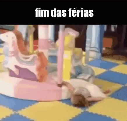 Girl Laying in Front of Merry Go Round Fim Das Ferias