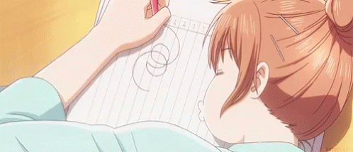 Girl Laying on Floor Drawing With Pen