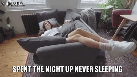Girl Lying In Couch Spent The Night Overthinking GIF