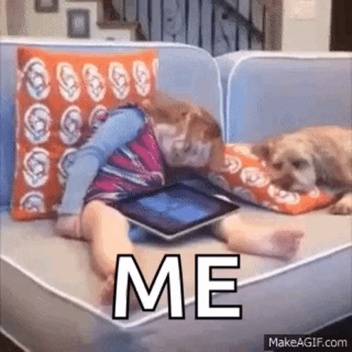 Girl Lying On Couch With Dog Using Tablet GIF