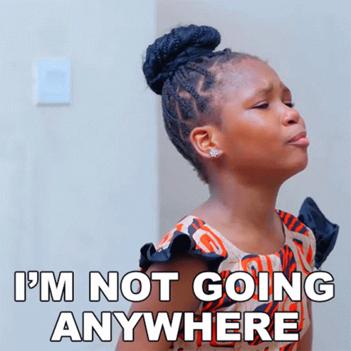 Girl Making Funny Face Saying I'm Not Going Anywhere