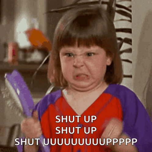 Girl Making Funny Face Saying Shut Up
