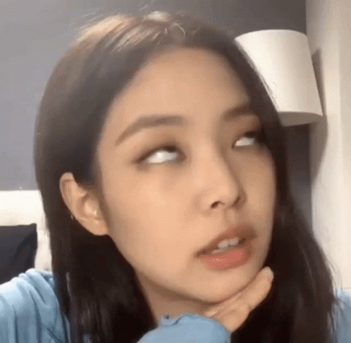 Girl Making Funny Face with Hand on Chin