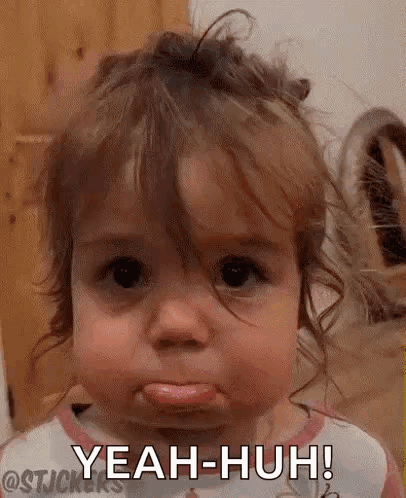 Girl Making Funny Face with Tongue Out