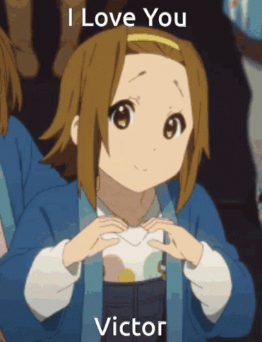 Girl Making Heart Hands Saying I Love You Victor