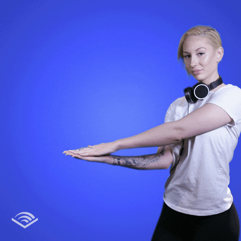 Girl Moving Her Arms Like She's Opening Book GIF