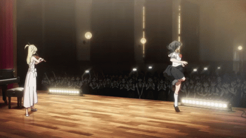 Girl Playing Violin and Girl Dancing on Stage