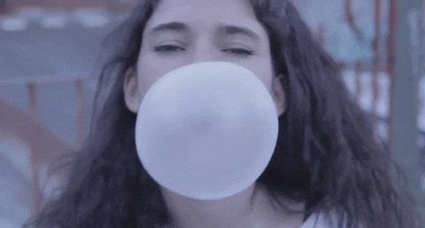 Girl Popping A Huge Bubble Gum GIF