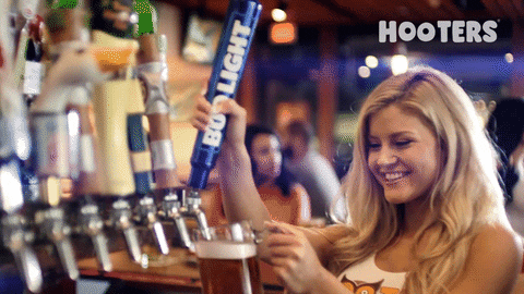 Girl Pouring Bud Light On Her Bottle GIF