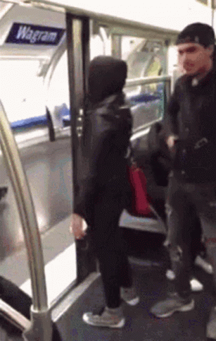 Girl Pushed Out Of Train GIF