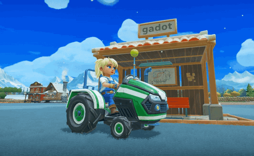 Girl Riding Green Tractor in Front of Gadot Sign