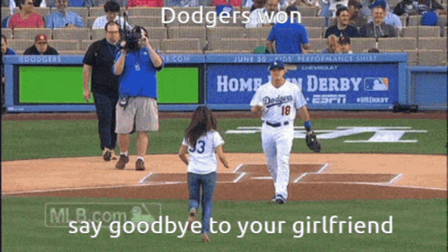Girl Running Toward Dodgers Player