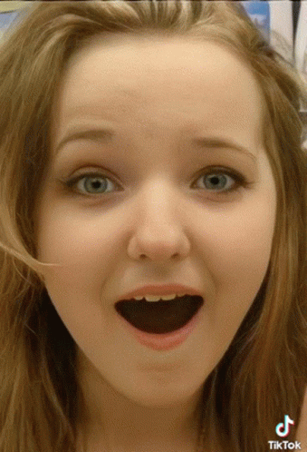 Girl's Face Close Up TikTok Logo GIF