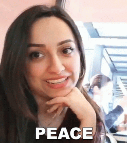 Girl Saying Peace GIF