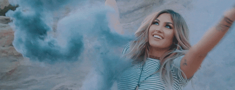 Girl Scattering Smokey Blue Color GIF