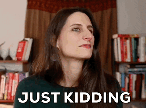 Girl Serious And Then She Say Just Kidding GIF