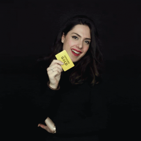 Girl Showing A Gold Vip Card GIF