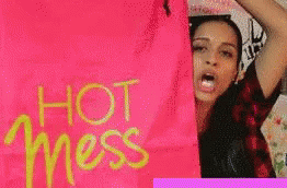 Girl Showing Hot Mess Banner GIF