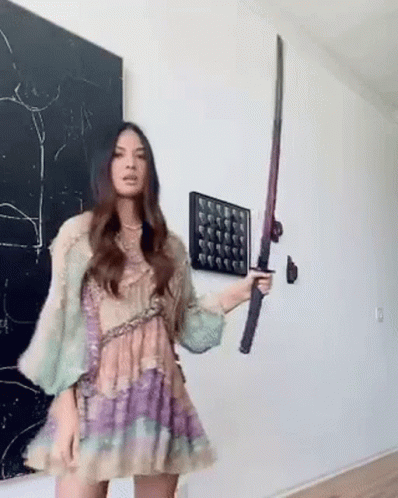 Girl Showing Off Sword Skill GIF