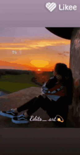 Girl Sitting at Sunset With Like Button Above