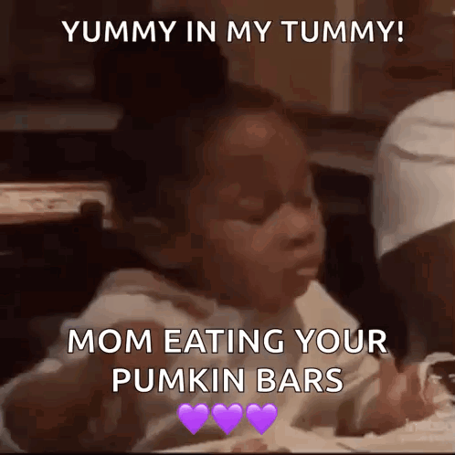 Girl Sitting at Table Eating Pumpkin Bars