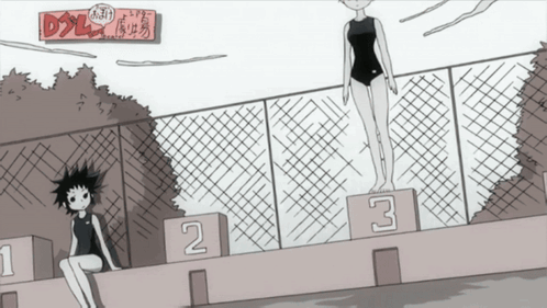 Girl Sitting On Podium With Number 2 And 3 GIF